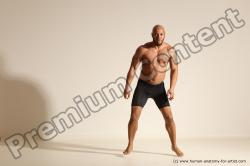 Underwear Gymnastic poses Man Black Muscular Bald Dancing Dynamic poses Academic